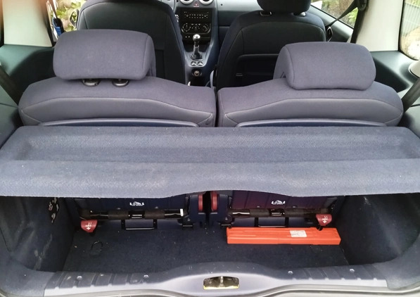 Peugeot 1007 cena 7800 przebieg: 170000, rok produkcji 2005 z Miechów małe 92